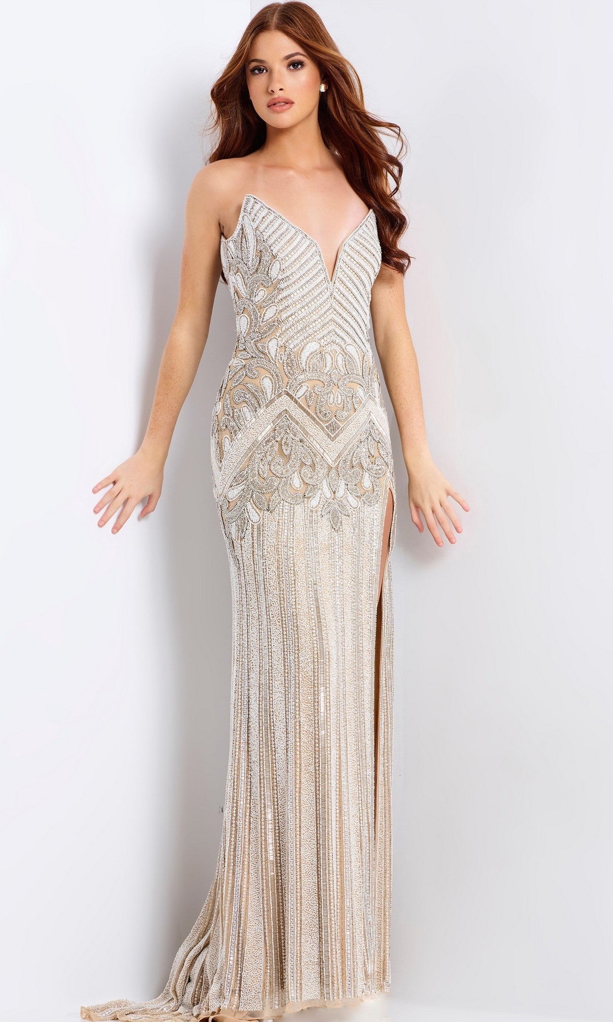 A woman poses against a white backdrop in the Jovani 49248, a long strapless prom dress featuring gold and silver sequins, geometric patterns, and a fitted silhouette—perfect for glamorous occasions.